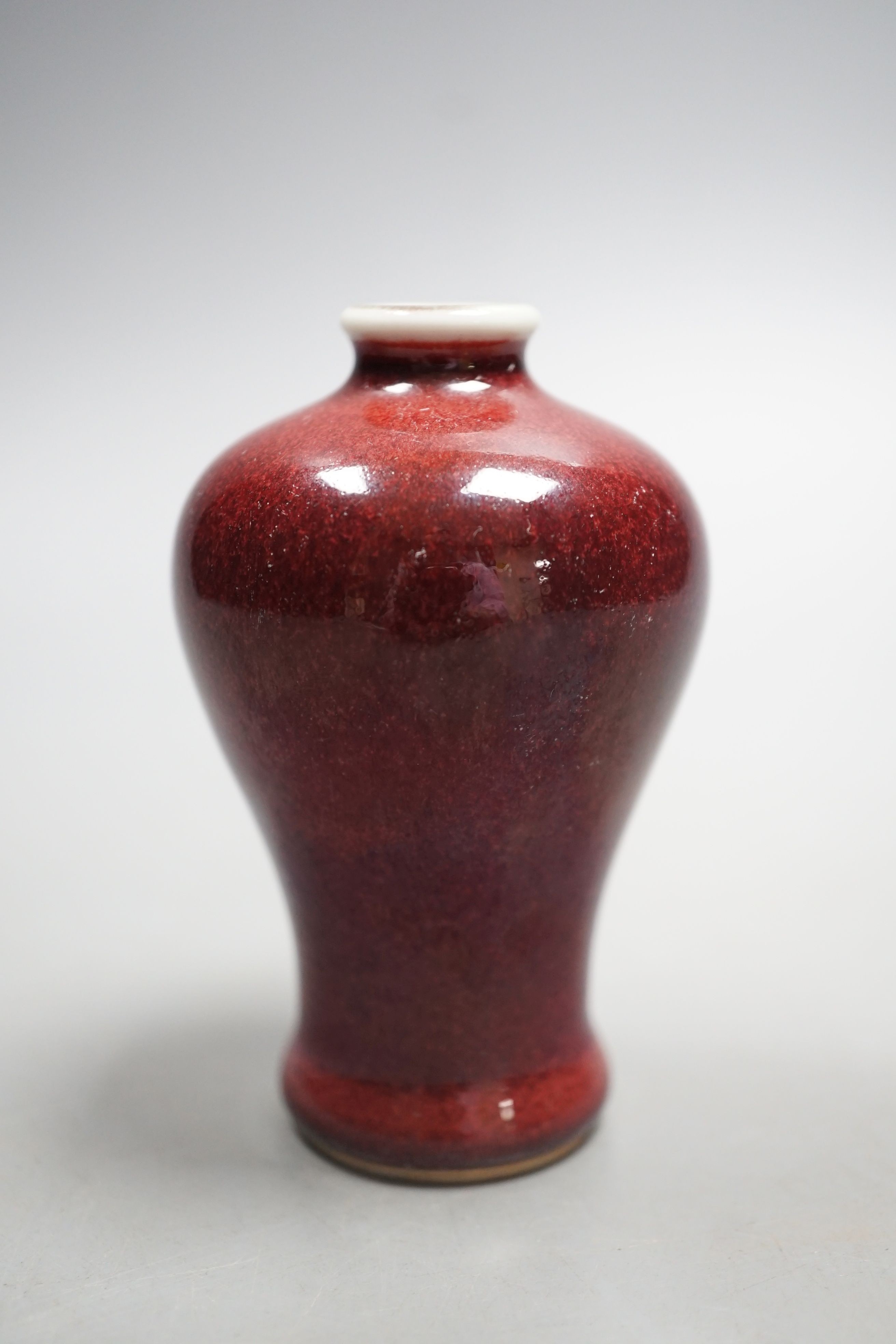 A Chinese sang-de-boeuf glazed small Meiping, 9 cm high